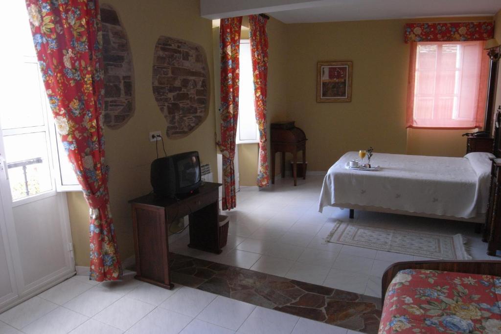 Habitación Doble con cama supletoria - 1 o 2 camas