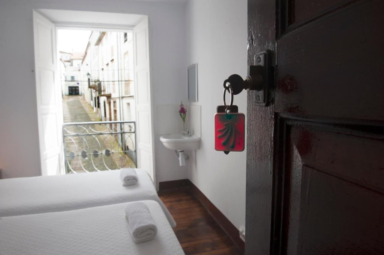 Camera Standard Doppia con Letti Singoli con Bagno in Comune