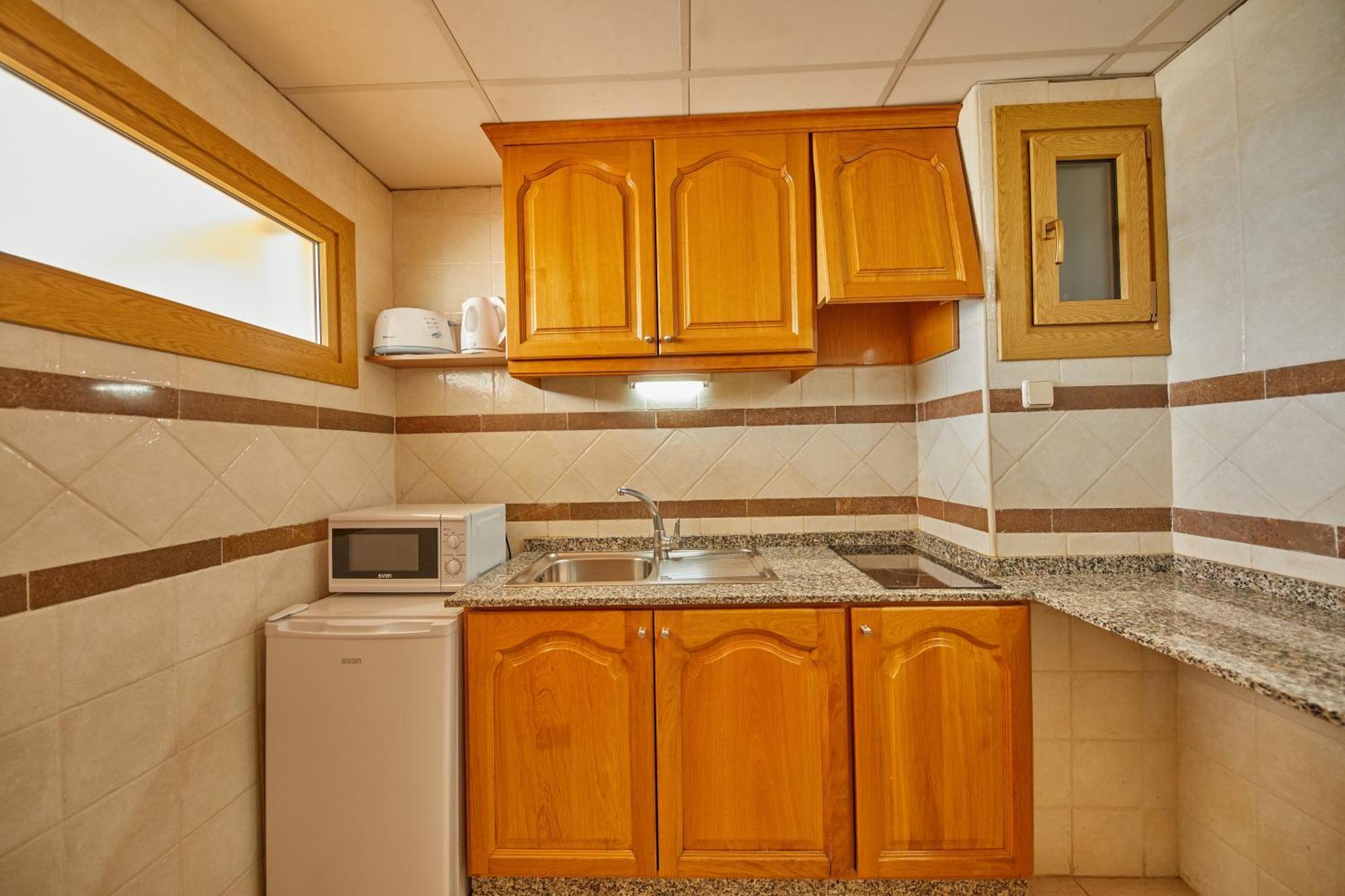 Appartement met 2 Slaapkamers en Uitzicht op het Zwembad