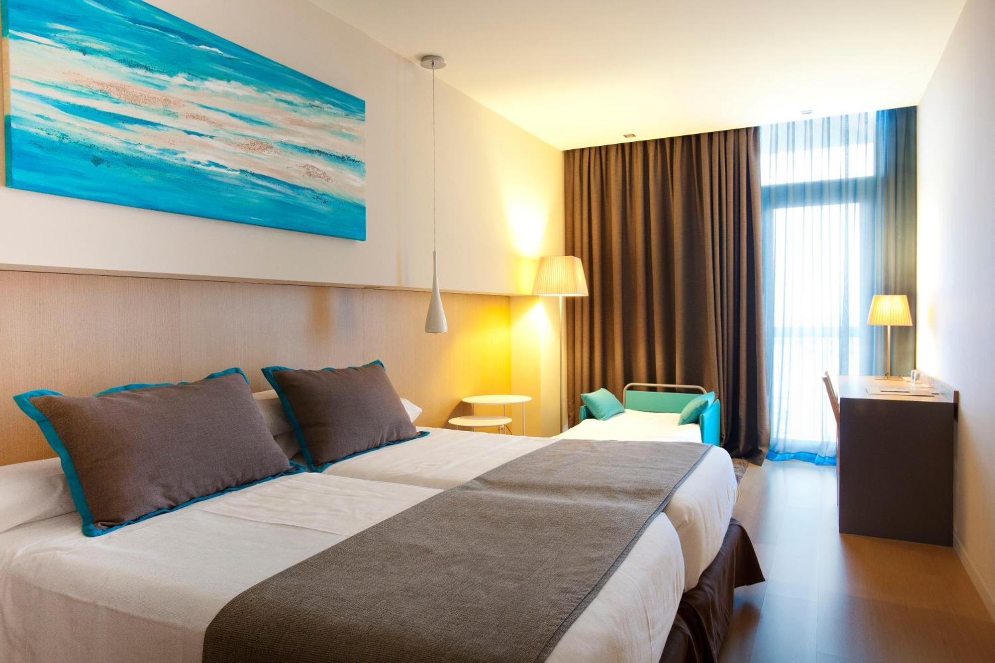 Dreibettzimmer mit Meerblick