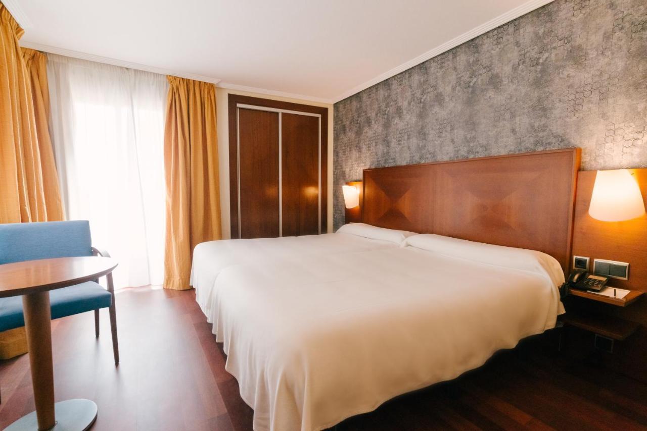 Camera Matrimoniale/Doppia con Letti Singoli con Letto Supplementare