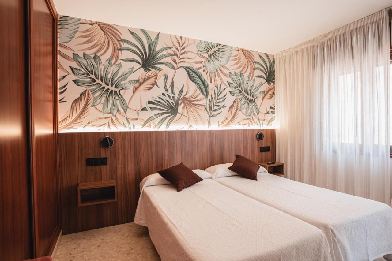 Habitación Doble (2 adultos + 1 niño)