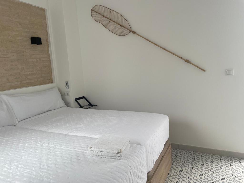 Dvoulůžkový pokoj s manželskou postelí a balkonem