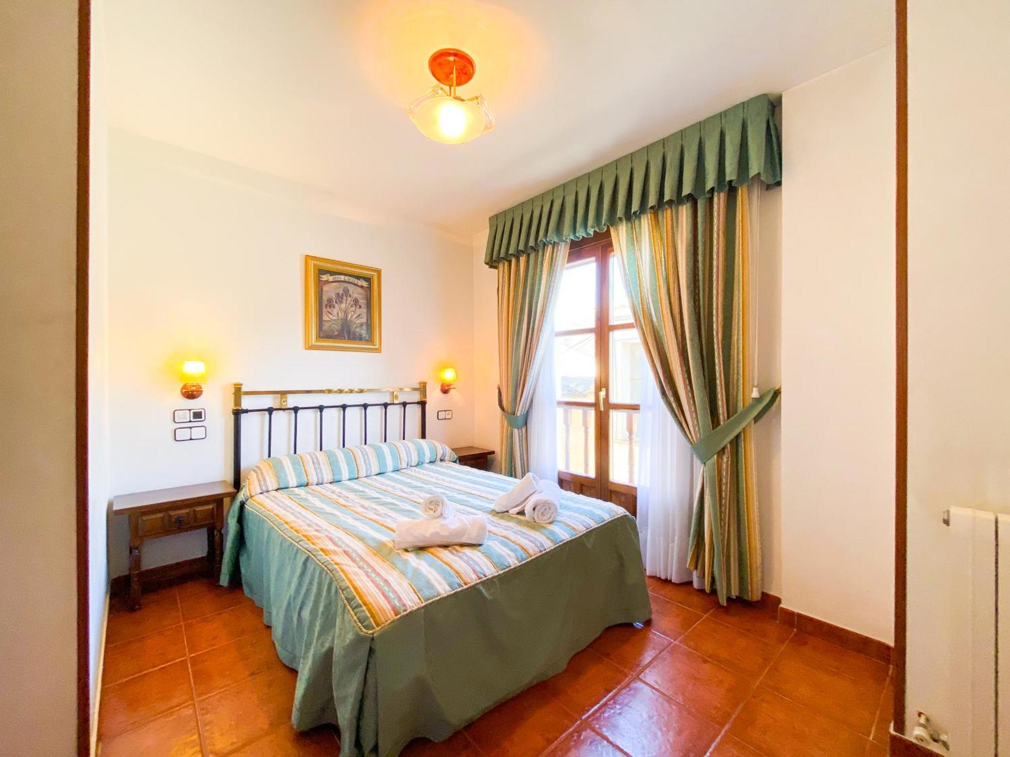 Habitación Doble con balcón (3 adultos)