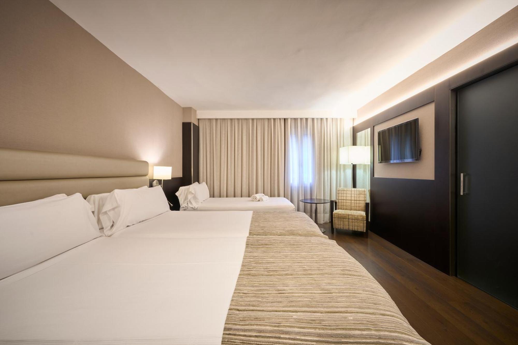 Habitación Triple (2 adultos + 1 niño)
