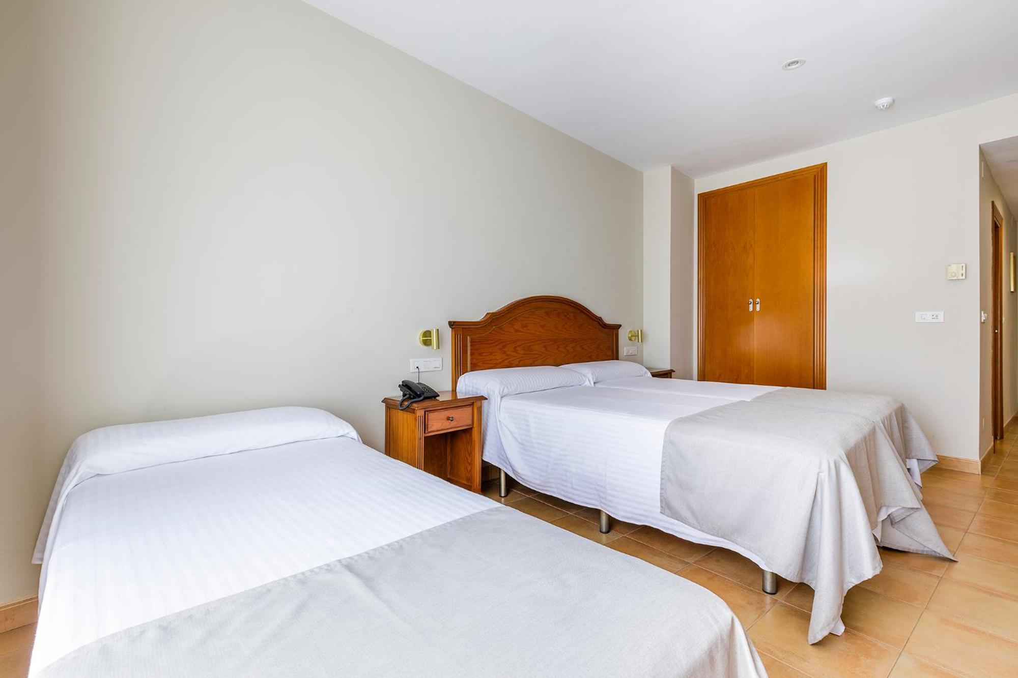 Triple Room (2 Adults + 1 Child)