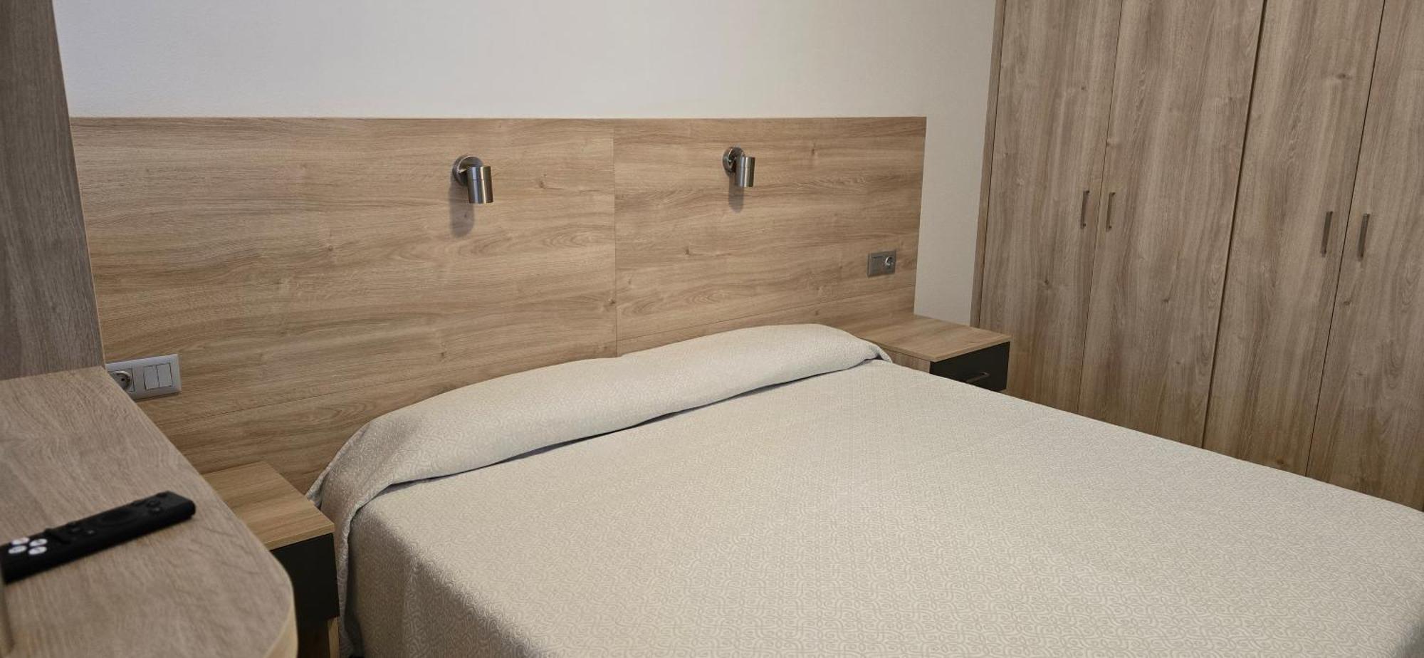 Estudio con cama extragrande