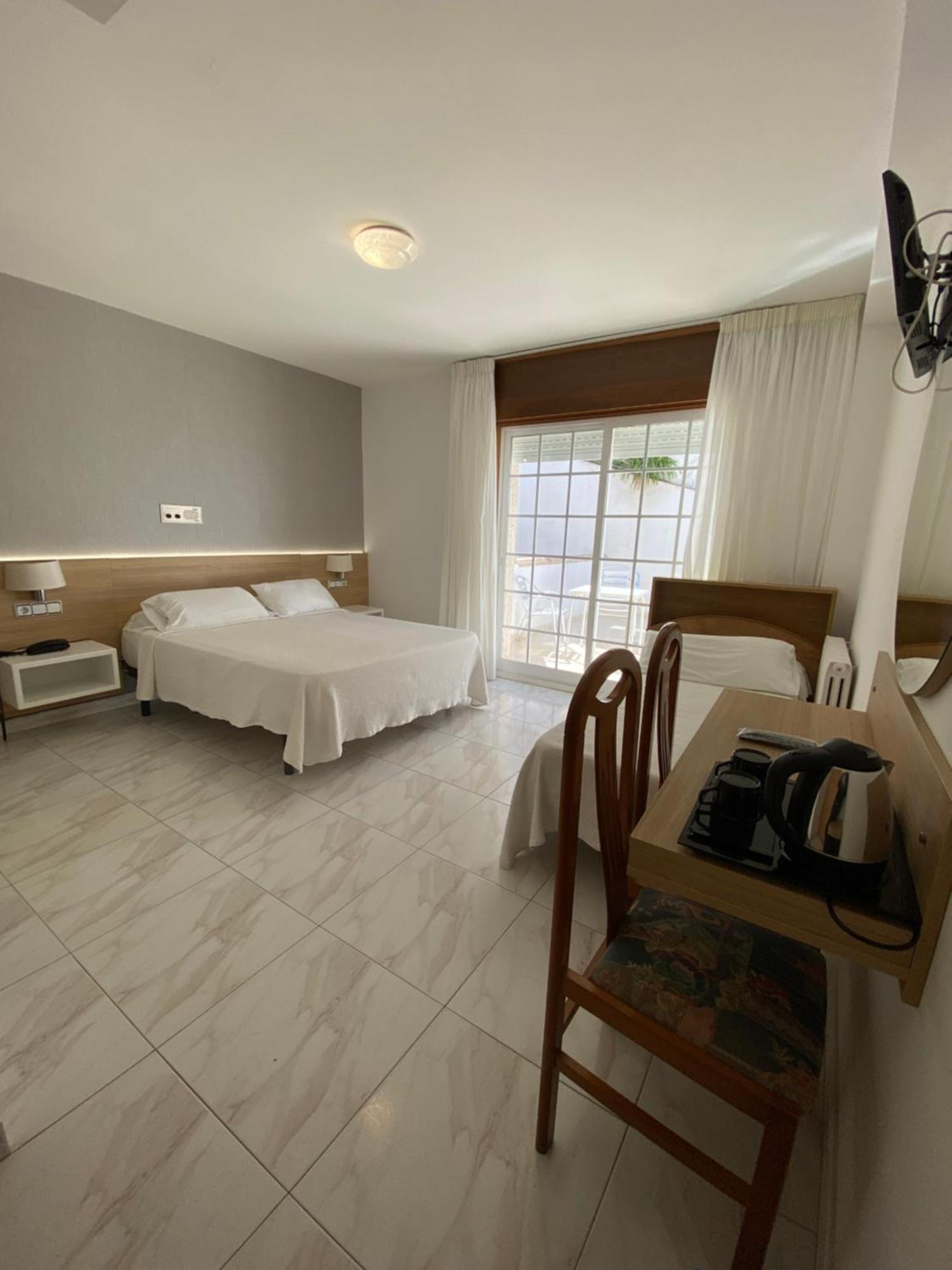 Habitación Doble con cama supletoria - 1 o 2 camas