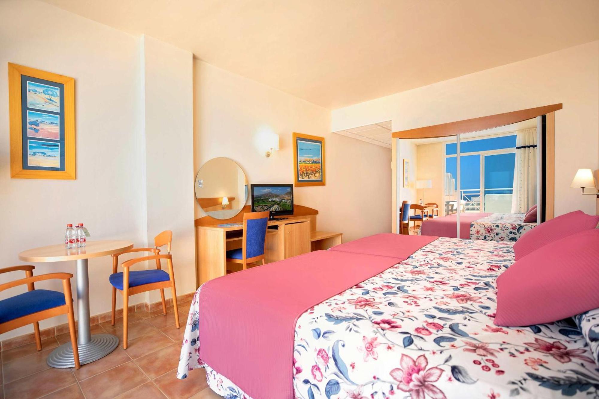 Double Room with Two Double Beds (2 Adults + 1 Child )