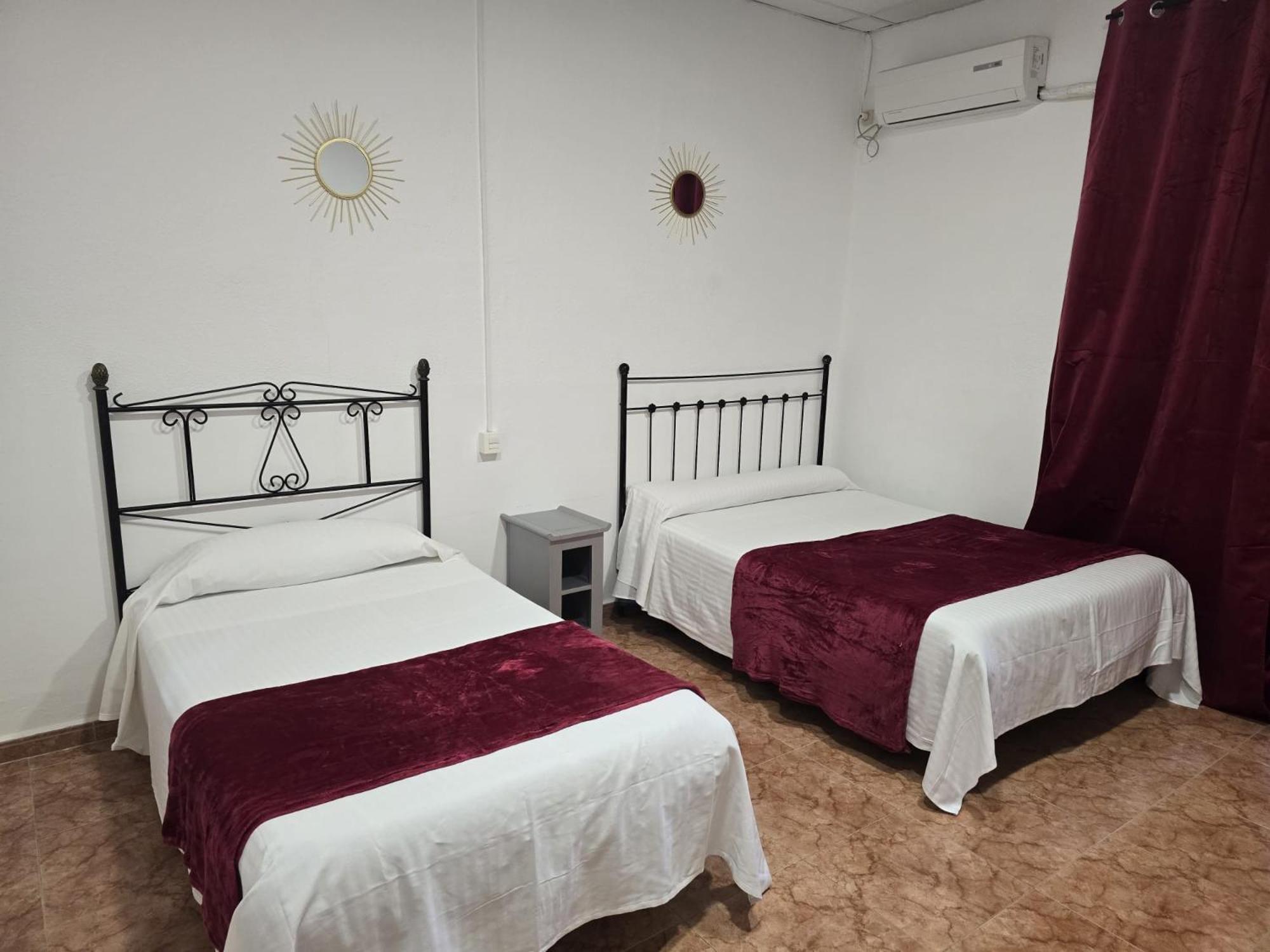 Camera Tripla con Bagno in Comune