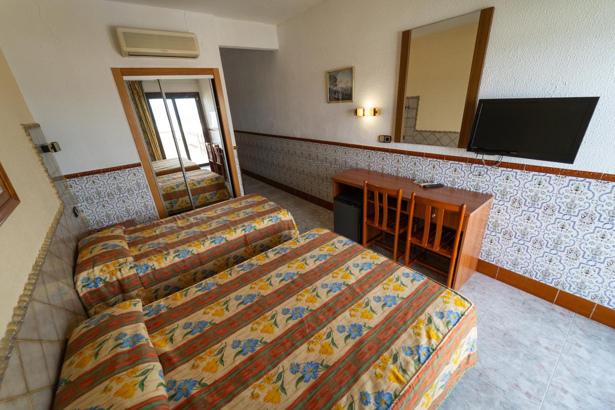 Chambre Quadruple (2 Adultes + 2 Enfants)