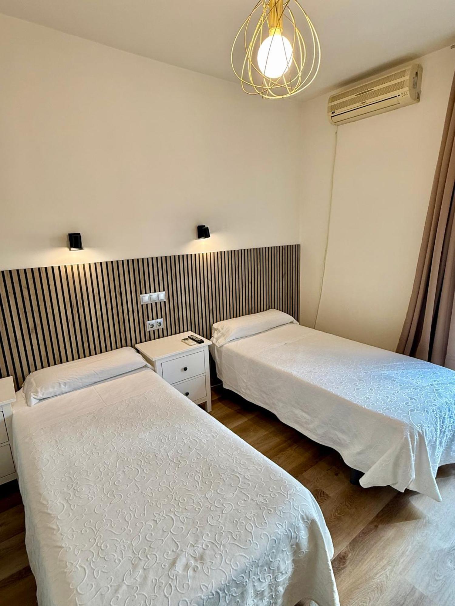 Quarto Twin com Casa de Banho Partilhada