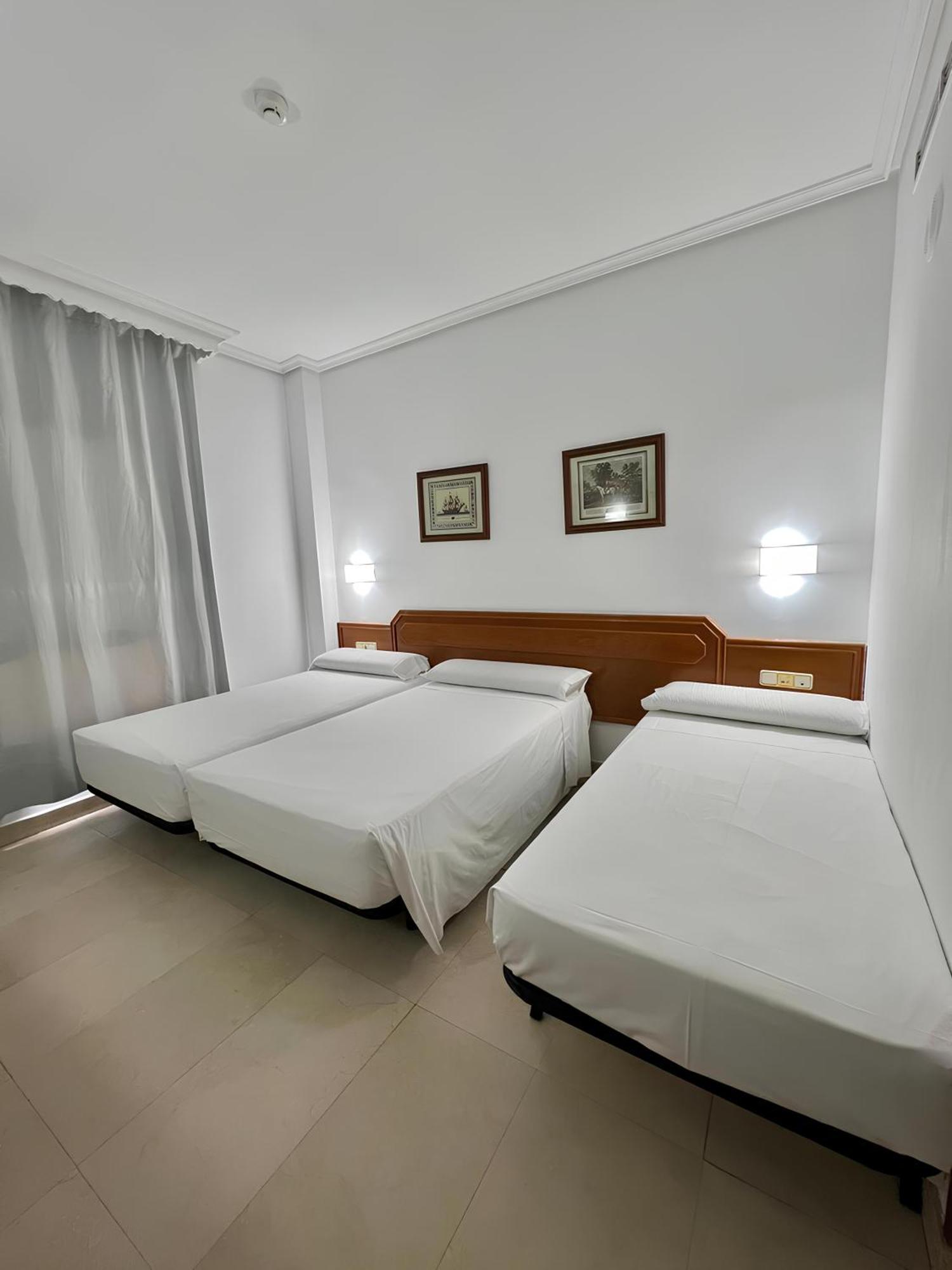 Habitación Triple (2 adultos + 2 niños)