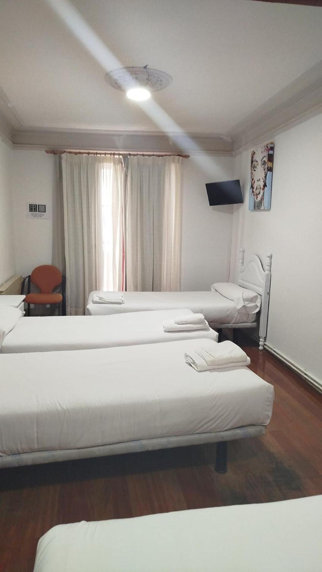 Chambre Triple avec Salle de Bains Commune