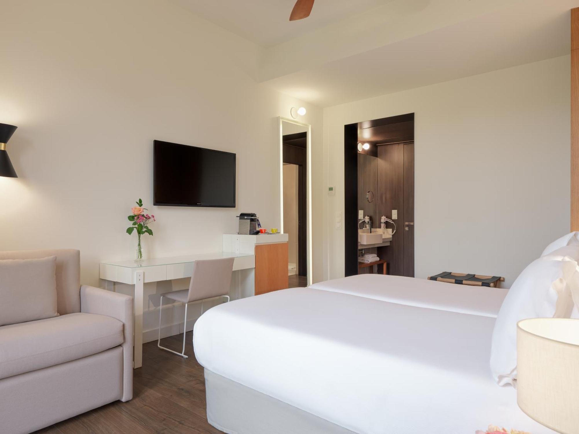 Quarto Triplo (2 Adultos)