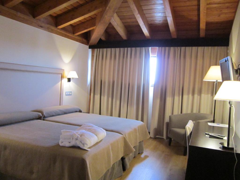 Habitación Superior con 2 camas individuales y acceso al spa