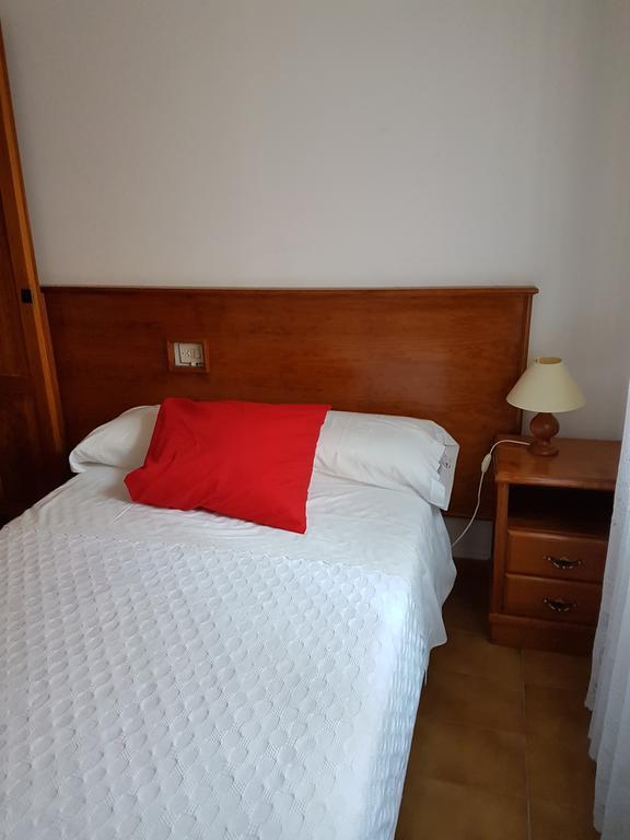 Habitación individual con aseo compartido