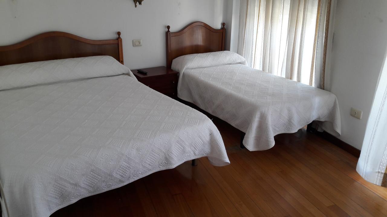 Quarto Quádruplo com Varanda