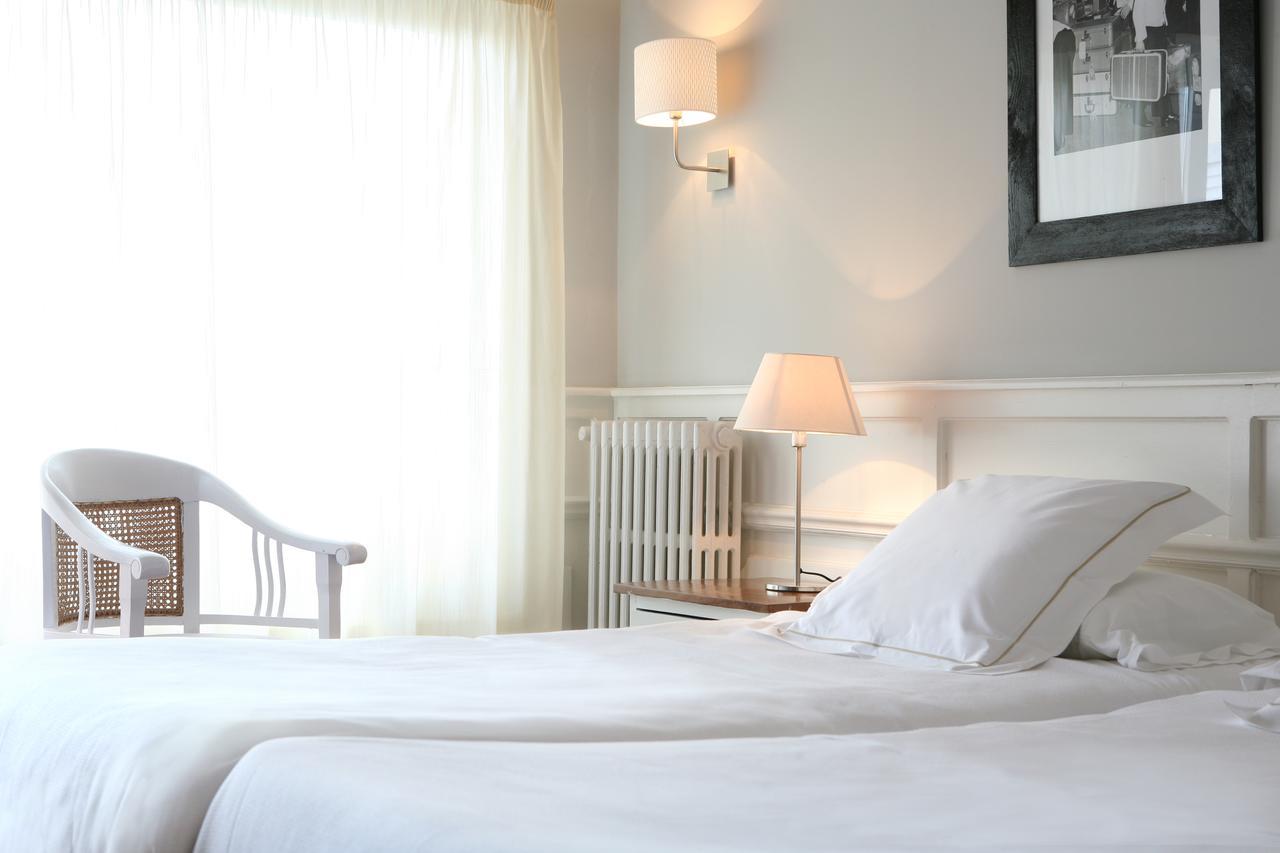 Chambre Triple - Vue sur Ville
