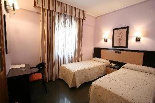 Quarto Twin com Estacionamento