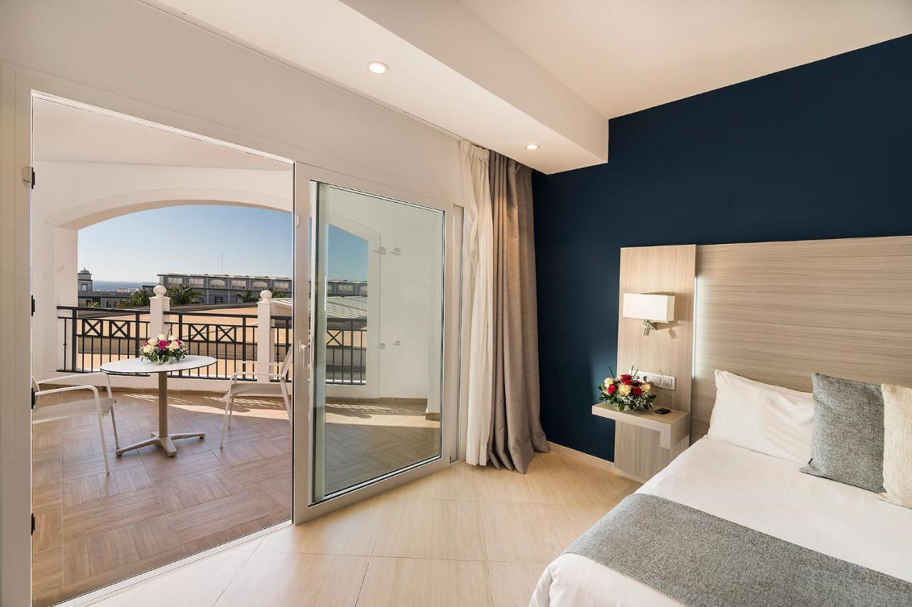 Double or Twin Room with Side Sea View,767265211:JPEG