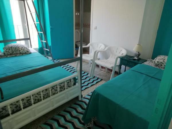 Chambre Quadruple avec Salle de Bains Privative